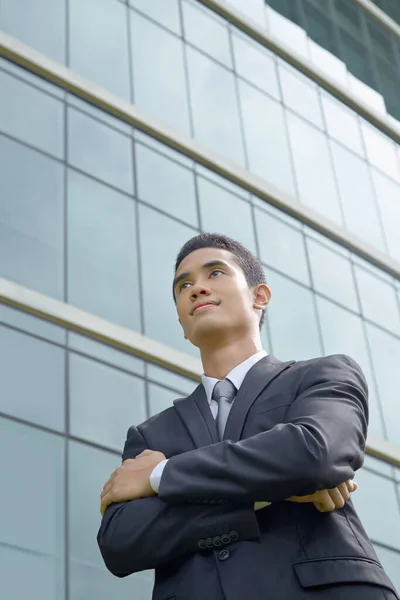 Jovem Empresário Alegre Pensando — Fotografia de Stock