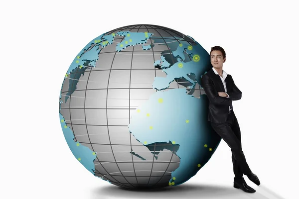 Businessman Leaning Giant Globe — Stock Photo, Image