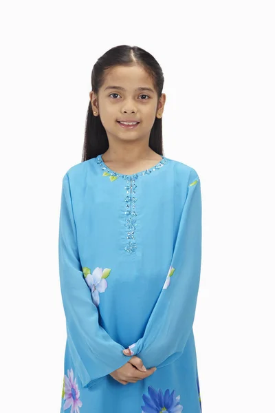 stock image Girl in baju kurung smiling at the camera