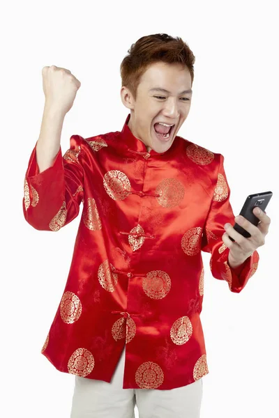 Man Traditional Clothing Cheering While Reading Text Message Phone — Stock Photo, Image