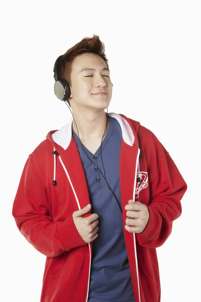 Man Hooded Jacket Listening Music Headphones — Stock Photo, Image