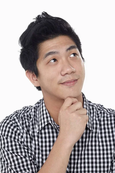 Beyaz arka planda izole edilmiş bir adamın yüz ifadesi