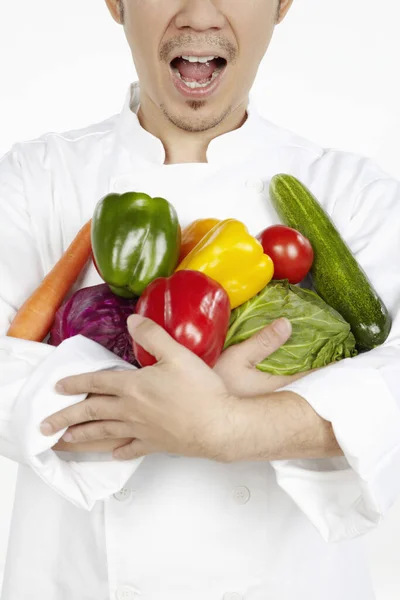 Asian Chef Armful Vegetables Stock Photo