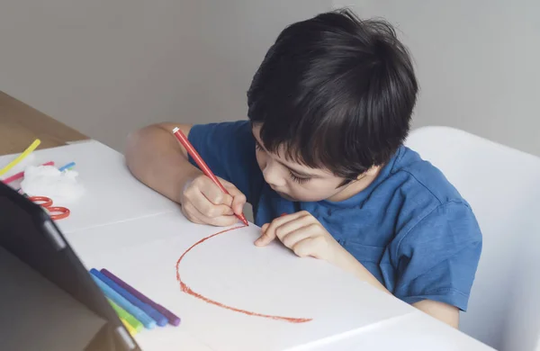 Kid Red Pen Colouring Rainbow Paper Child Using Digital Tablet — стоковое фото