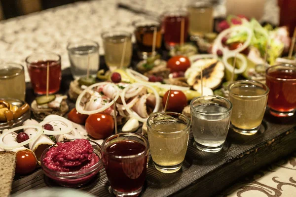 Vodka kvass mors and snacks salted cucumber salo meat — Stock Image Vodka kvass mors and snacks salted cucumber salo meat Stock Picture