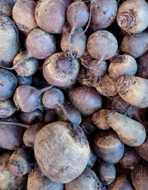 Pancarlar, fotoğrafı kapatın. Soyut arka plan. Taze sebzeler. Bir sürü pancar. Yerel markette sebzeler yakın çekim fotoğrafı..
