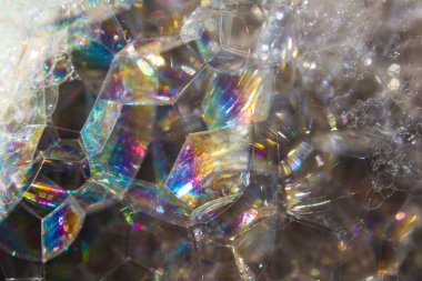 Sabun köpükleri detaylarda kapanır. Soyut arkaplan. 