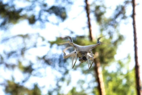 Quadcopter. An unmanned hi-end aerial vehicle with four propellers that is usually equipped with a mini-camera that allows you to take photos and videos in flight.