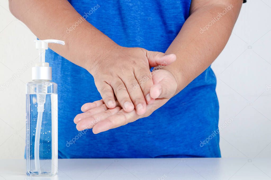 Washing hands with alcohol Put in the palm and rub all over the palm. Back of hands and fingers Until the alcohol evaporates until dry. Coronavirus prevention concept.