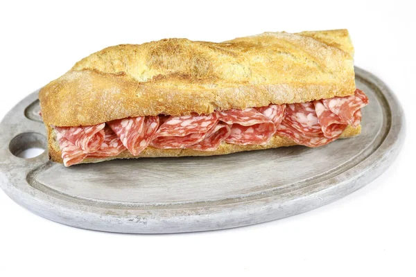 Dry sausage sandwich on a white background — Stock Image Dry Sausage Sandwich White Background Stock Photo