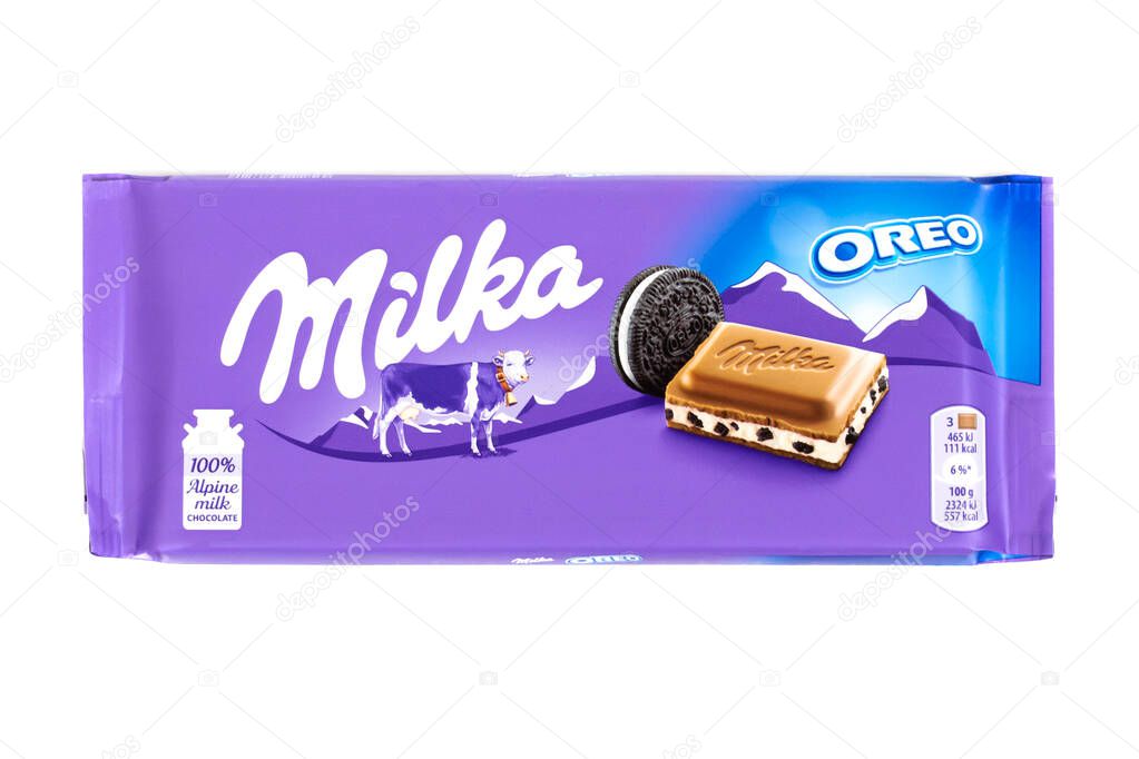 Plate of Milka brand chocolate with Oreo taste on a white background