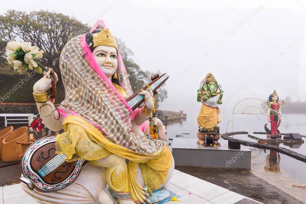 Hindu statues in the mist