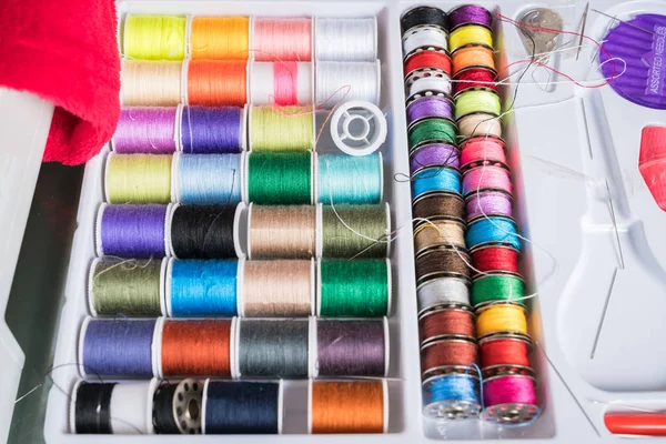 Sewing kit with colored spools — Stock Photo, Image