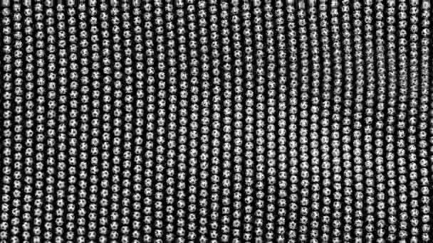 Soccer balls forming fabric flag. Looped video. Black screen. — Stock Video