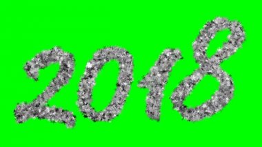  Yeşil bir arka plan üzerinde titreşen kar taneleri oluşan 2018 yeni yıl yazıt. Ekran modunda kullanmak için en iyi. 4k, 3840 x 2160. Sembol 2018 yeni yıl. İlmekledi video.