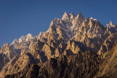 Passu cathedral peak at sunset, Gulmit valley, Gilgit Baltistan, clipart