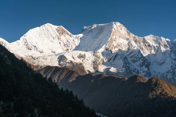 Manaslu mountain peak, eighth highest mountain peak in the world at sunset, Himalaya mountain range in Nepal, Asia