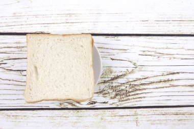 ekmek dilimleri üzerine eski rustik ahşap arka plan, üstten görünüm, kopya alanı, yatay kompozisyon