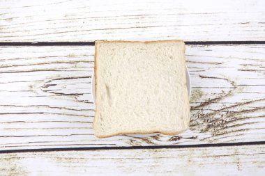 ekmek dilimleri üzerine eski rustik ahşap arka plan, üstten görünüm, kopya alanı, yatay kompozisyon