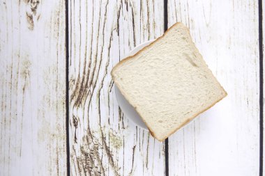 ekmek dilimleri üzerine eski rustik ahşap arka plan, üstten görünüm, kopya alanı, yatay kompozisyon