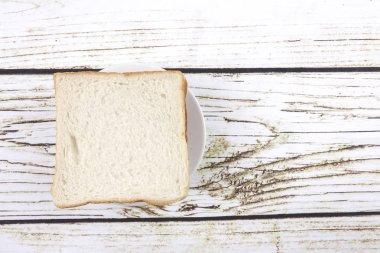 ekmek dilimleri üzerine eski rustik ahşap arka plan, üstten görünüm, kopya alanı, yatay kompozisyon