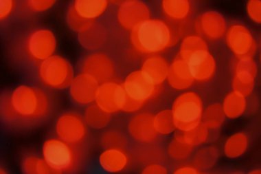 Defocused siyah arka plan üzerinde renkli hafif bulanık bokeh. Arka plan