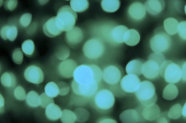 Defocused siyah arka plan üzerinde renkli hafif bulanık bokeh. Arka planı ve desen 