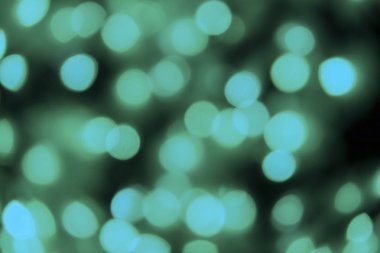 Defocused siyah arka plan üzerinde renkli hafif bulanık bokeh. Arka planı ve desen 