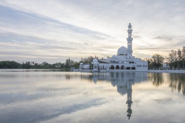 Reflections of Tengku Tengah Zaharah Mosque (floating mosque), Kuala Ibai Terengganu, Malaysia clipart