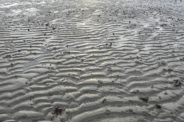 Padrão de areia de uma praia — Fotografia de Stock