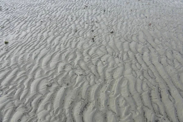 Sand mönster på en strand — Stockfoto