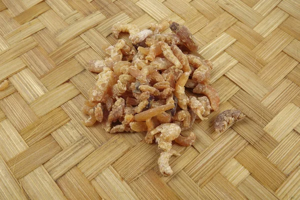 Dried shrimp isolated on wooden background — Stock Photo, Image