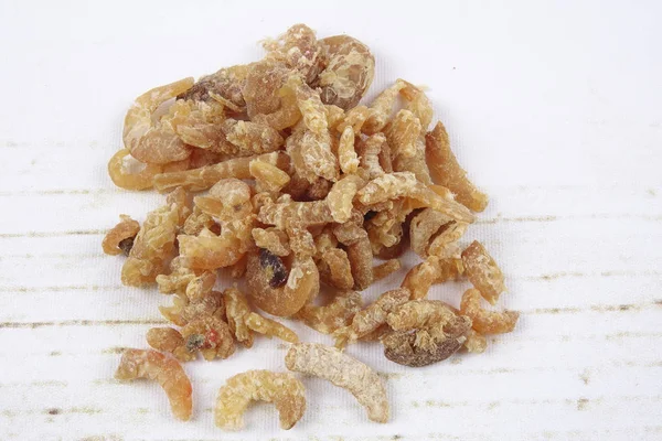 Dried shrimp isolated on wooden background — Stock Photo, Image