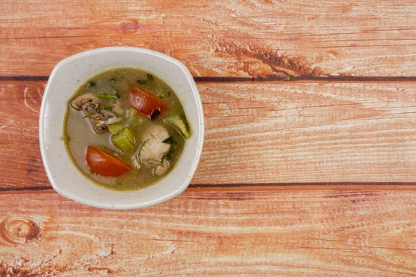 Chicken soup on wooden table — Stock Photo, Image