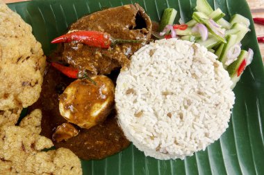 Nasi dagang, Malezya Yarımada'nın Doğu kıyısındaki bir popüler Malezya yemek.
