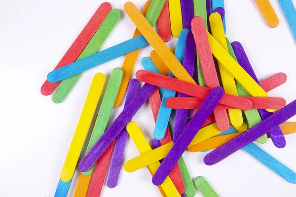 Colourful wooden sticks on white background — Stock Photo, Image