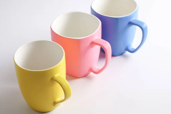 Colored mug isolated on white — Stock Photo, Image