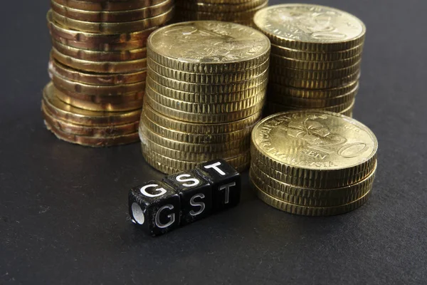 Sikke ve Gst kelime yığını. İş ve vergi kavramı.