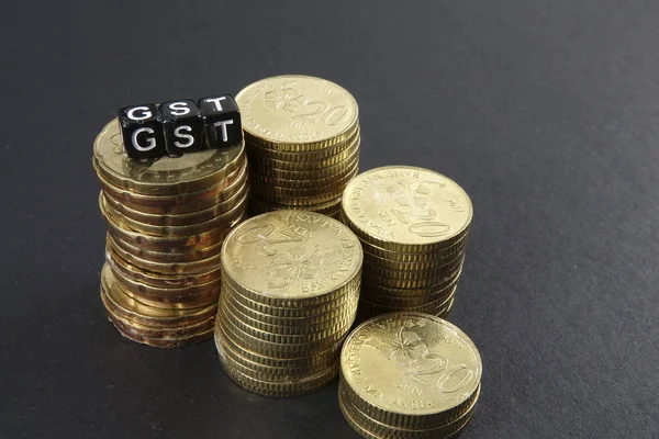 Sikke ve Gst kelime yığını. İş ve vergi kavramı.