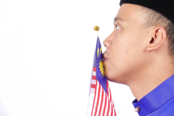 Azjatycka młody człowiek z Flaga Malezji do obchodów Narodowego dnia. — Zdjęcie stockowe