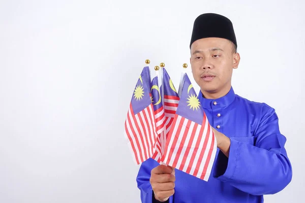 Asijský mladík s Malajsie vlajka národní den oslav. — Stock fotografie