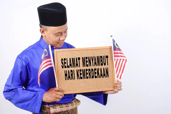 Asijský mladík s Malajsie vlajka národní den oslav — Stock fotografie