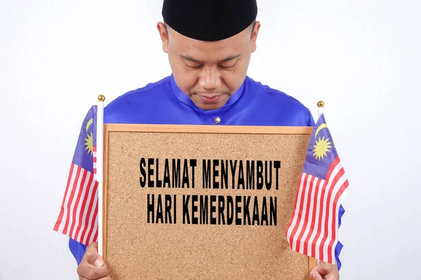 Asijský mladík s Malajsie vlajka národní den oslav — Stock fotografie