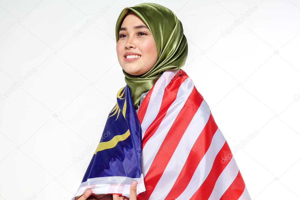 Young beutiful lady holds Malaysia flag isoleted on whitebackground.