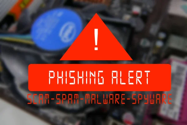 Blurred PCB Closeup of electronic circuit board with CPU processor with PHISHING ALERT words. — Stock Photo, Image