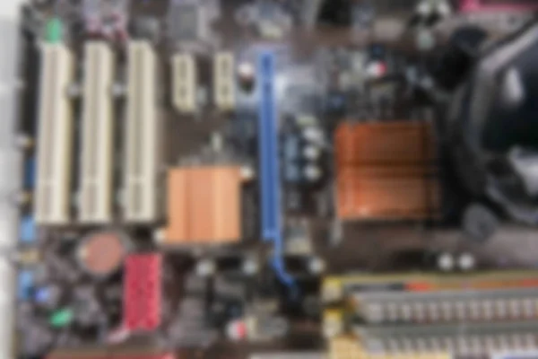 PCB offuscato Primo piano del circuito elettronico con processore CPU . — Foto Stock