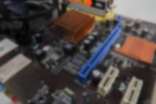 Blurred PCB Closeup of electronic circuit board with CPU processor. — Stock Photo, Image