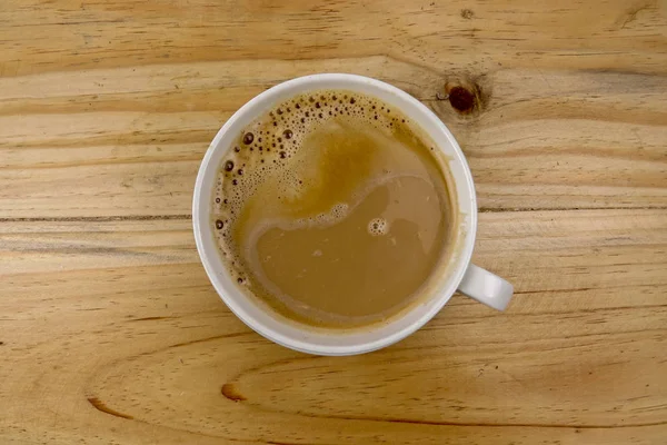 Bovenaanzicht Een Kopje Latte Houten Tafel — Stockfoto