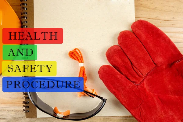 HEALTH AND SAFETY PROCEDURE CONCEPT: Safety hat,glove,glasses,ea