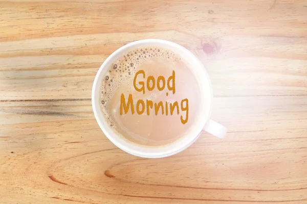 Guten Morgen Kaffee in Tasse über Holztisch — Stockfoto